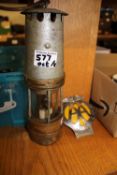 A minors Lamp together with Vintage AA membership Badge