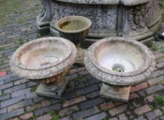 Three vintage reconstituted stone garden planters, diameter of the two largest planters 56cm (3).