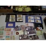 A mixed collection of stamps and postcards to include 4 silver stamps, 1 gold stamp, Harry Potters