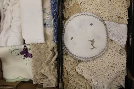 A quantity of lace and linen to include table cloths, place mats, doilies etc ( 2 trays)