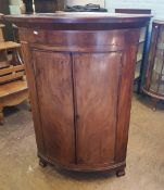 Mahogany corner cabinet, raised on bracket feet, 128cm H x 88cm W x 57cm D.