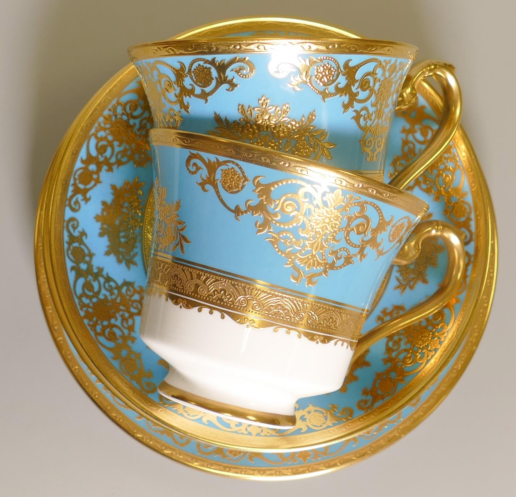 De Lamerie Fine Bone China heavily gilded Turquoise Exotic Garden patterned trios, specially made