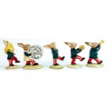 Rare Royal Doulton Bunnykins figures from the Oompah Band in a green colour way comprising -