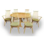 Ercol mid century blonde Windsor drop leaf table & six chairs, including 2 carvers. (6)