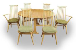 Ercol mid century blonde Windsor drop leaf table & six chairs, including 2 carvers. (6)
