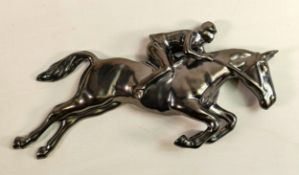 Beswick wall plaque as Huntswoman on jumping horse 1513, in silver lustre glaze.
