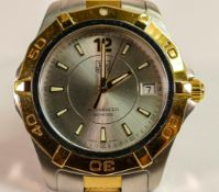 Tag Heuer Aquaracer gentleman's quartz wristwatch, stainless steel and gold bezel and bracelet,