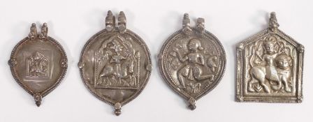 Four large Indian (or similar) silver pendants, late 19th / early 20th century. Largest 72mm high,