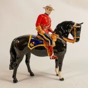 Beswick Canadian Mountie policeman on black horse, restored ears.