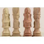 African soft stone carved chess set, 32 pieces, height of King 11.5cm.