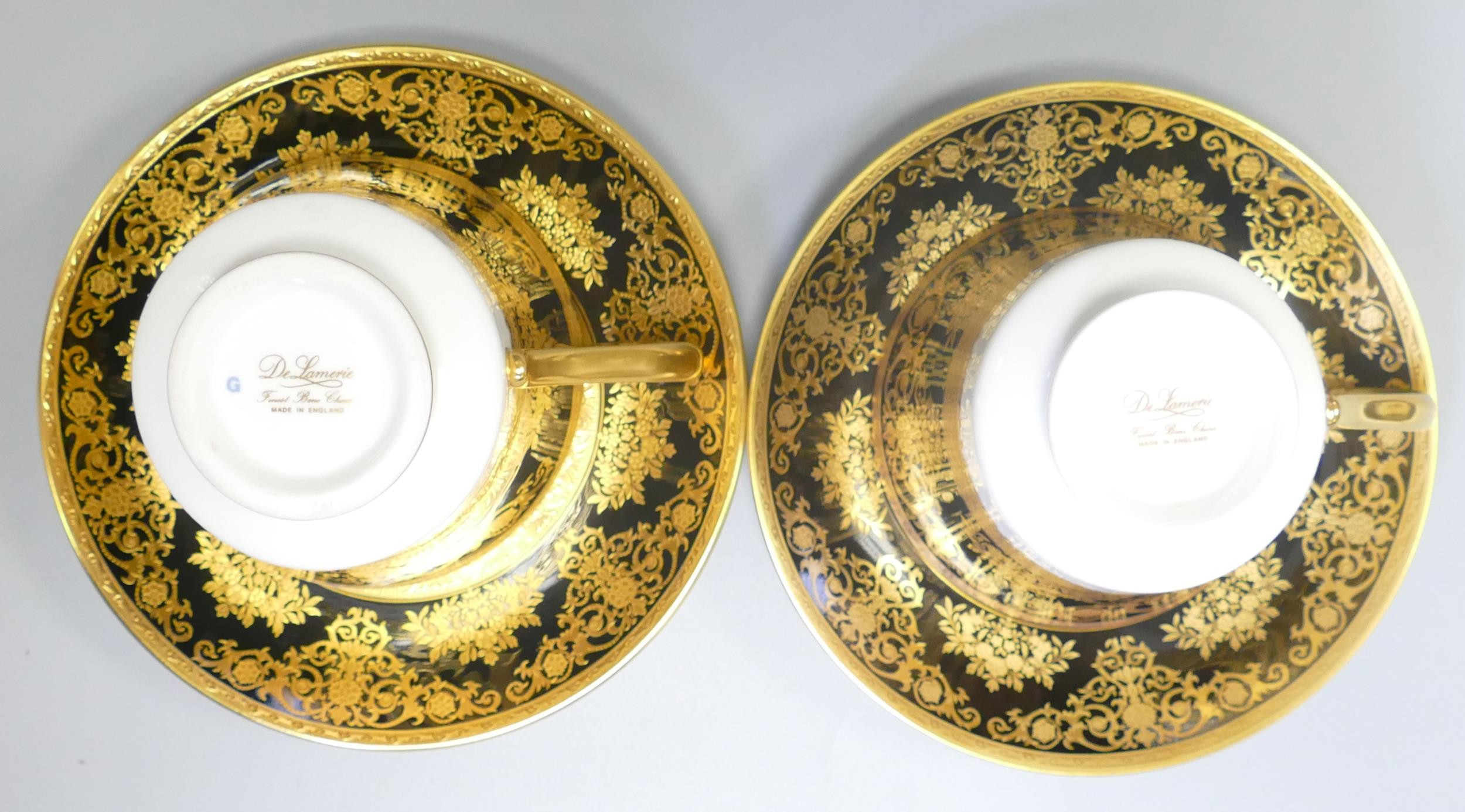 De Lamerie Fine Bone China heavily gilded Black Exotic Garden patterned cup & saucer sets, specially - Image 2 of 2