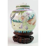 Chinese Famille Rose ginger jar, decorated with dancing figures on wooden base, height 17cm