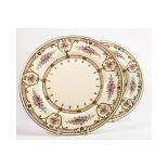 Pair of Wedgwood jewelled cabinet plates with floral decoration. Diameter 27.5cm. (2)