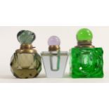 Heavy coloured glass inkwells with brass mounts, tallest 11.5cm. (3)