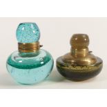 Heavy coloured glass inkwells with brass mounts, tallest 12cm. (2)