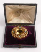 Victorian higher carat citrine & turquoise brooch in original case. Measuring 35mm x 28mm x 12mm