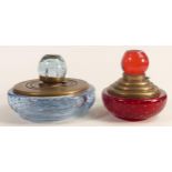 Heavy coloured glass inkwells with brass mounts, tallest 12cm. (2)