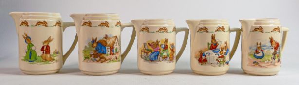 Royal Doulton Bunnykins collection of Casino Shaped jugs, all signed Barbara Vernon, tallest 11.5cm.