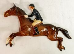 Beswick wall plaque as huntswoman on jumping horse 1515.