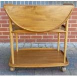 Mid century Ercol Windsor hostess trolley table, length 74 cm.