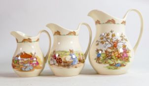 Royal Doulton Bunnykins collection of Albion jugs, tallest 15cm. (3)