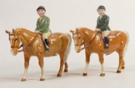 Two Beswick boy on Palomino pony 1500, one with leg a/f & one with chip to hat & chip to ear (2)