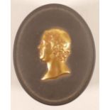 Wedgwood black & gilt decorated pill box with raised relief Josiah Wedgwood Death Mask, length 5cm.