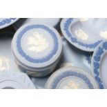 A collection of Wedgwood tri colour items to include - small planter, pin trays, lidded boxes