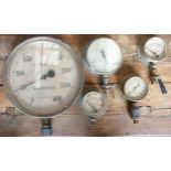 A collection of railway related large brass steam gauges, largest diameter 33cm. (5)