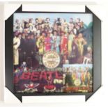 The Beatles album cover 'Sgt. Peppers Lonely Hearts Club Band' in the form of a framed ceramic