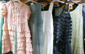 A collection of ladies vintage evening, cocktail, coat & girls summer dresses together with an