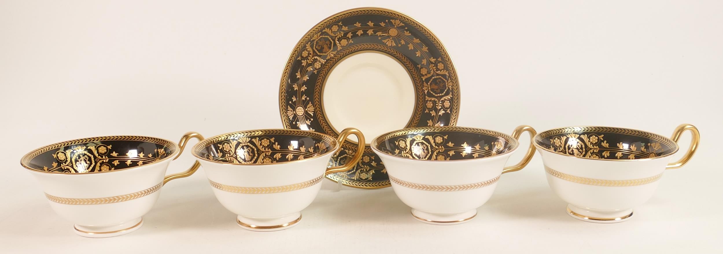 Four Wedgwood Astbury twin handled soup cups together with three matching saucers.