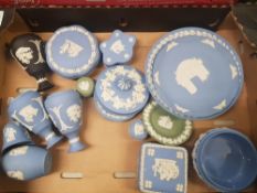 A collection of Wedgwood jasperware including vases, lidded boxes, pin trays, cabinet plates etc
