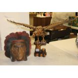 Carved wooden native American themed Wall Plaque together with Carved Wooden Eagle