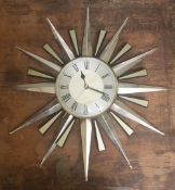 Vintage Metamec 'Sunburst' quartz wall clock. In working order.