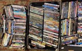 A large collection of DVD with titles such as Gladiator, bad Santa, bad boys 2 etc