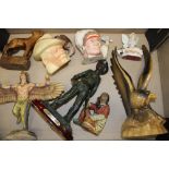 A collection of Native American/Wild West themed items to include resin figures, carved wooden