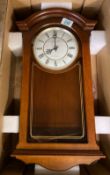 Boxed The London Clock Company battery operated wall clock, height 52cm