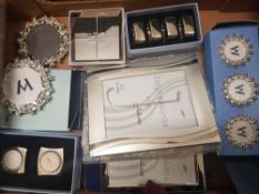 A mixed collection of items to include Wedgwood Modern Photo frame, boxed tea light set, boxed