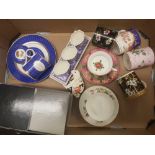A mixed collection of items to include Wedgwood Mugs & Saucers, Commemorative items, Coalport Candle