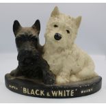 A Black & White Brentleigh Ware Scotch Whisky ceramic advertising figure.