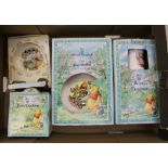 Royal Doulton Winnie the Pooh boxed mug and plate, bowl and mug, cup & saucer together with