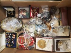 A large collection of vintage costume jewellery to include cased items, brooches, cufflinks,