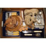 A collection of boxed cutlery items together with carved wooden musical fruit/nut bowl etc (1 tray).