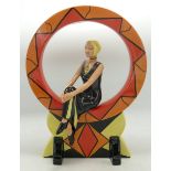 Lorna Bailey Ceramics figure Lorna sitting inside ring number 41/100, height 25cm.