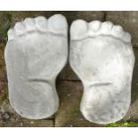 A pair of stone foot stepping stones