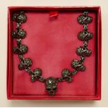 Butler & Wilson costume jewellery pewter effect diamante skull necklace