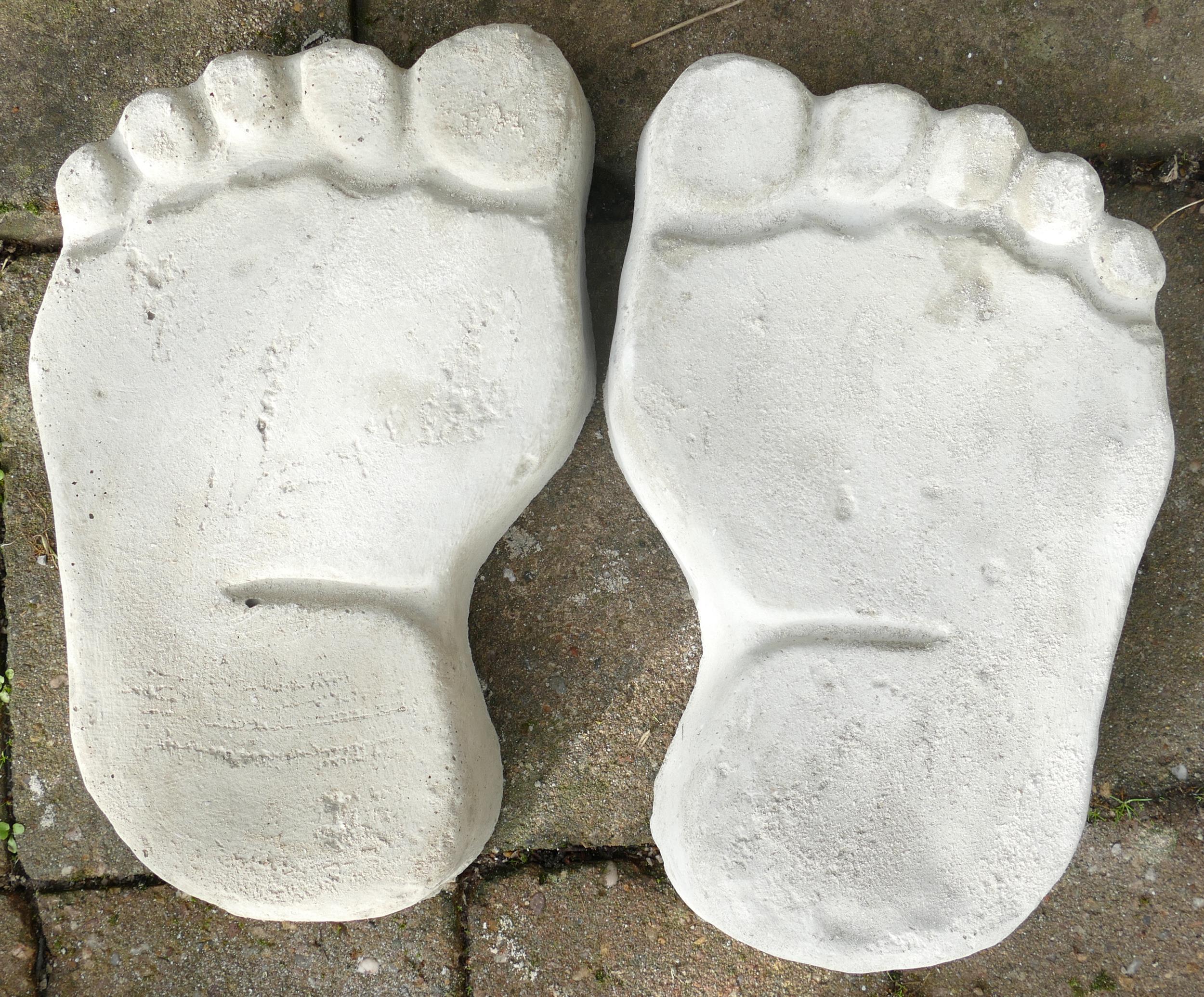 A pair of stone foot stepping stones