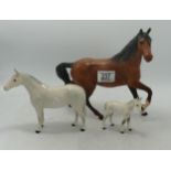 Beswick Spirit of wind 2689 together with small thoroughbred foal and a Royal Doulton Thoroughbred