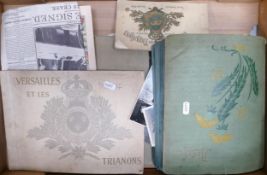 A collection of WW1 Era postcards & picture books